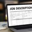 laptop with the words job descriptions to describe how to write effective job descriptions